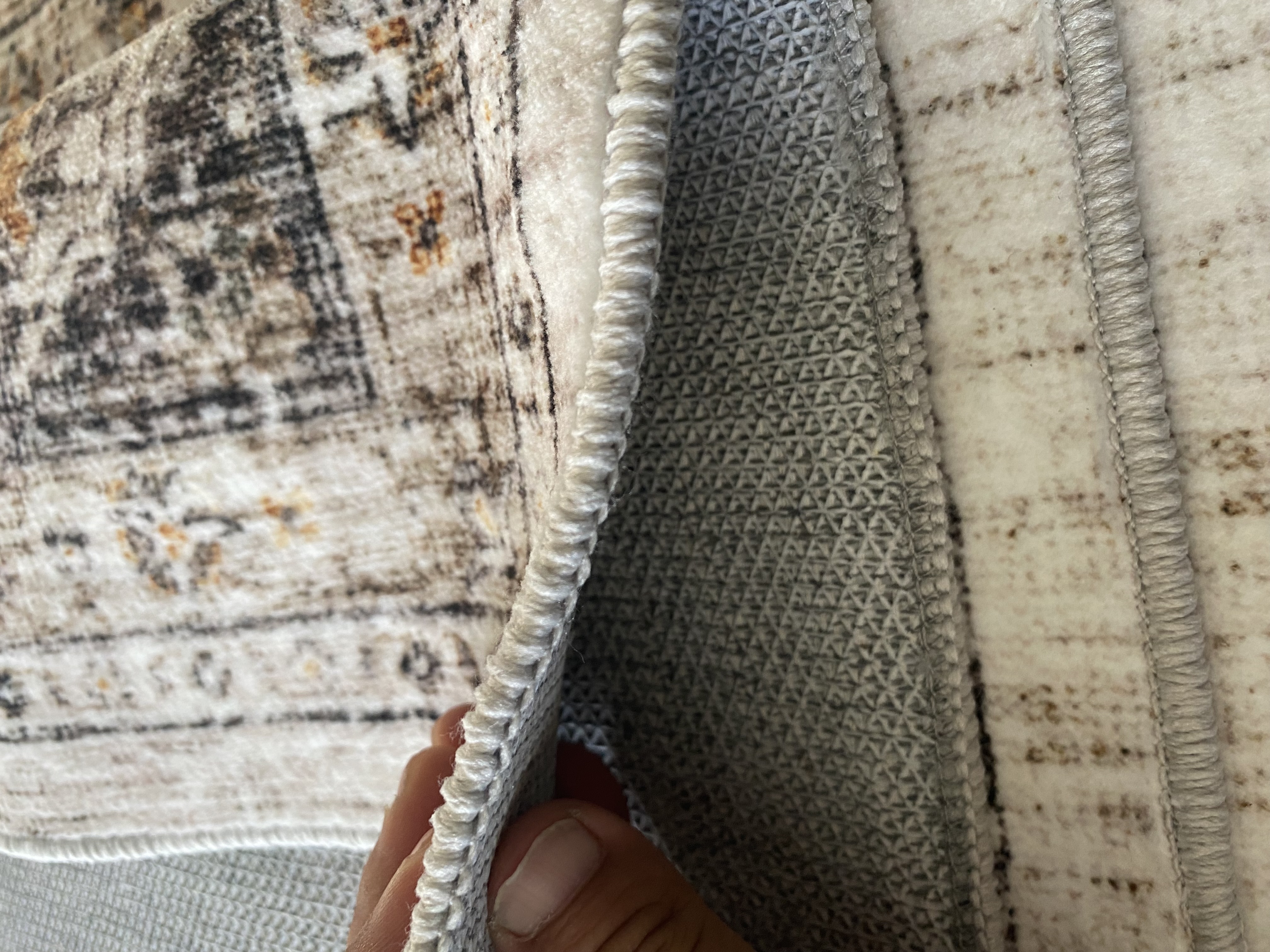 Washable rug edge and backing detail